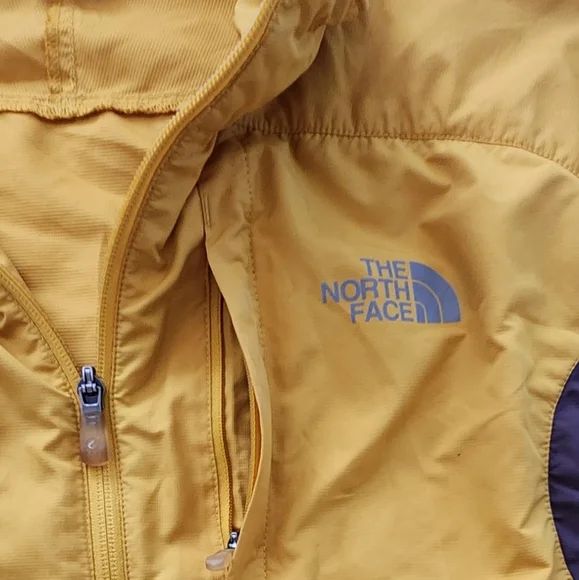 The North Face Flight SerieYellow and Gray Windbreaker.
